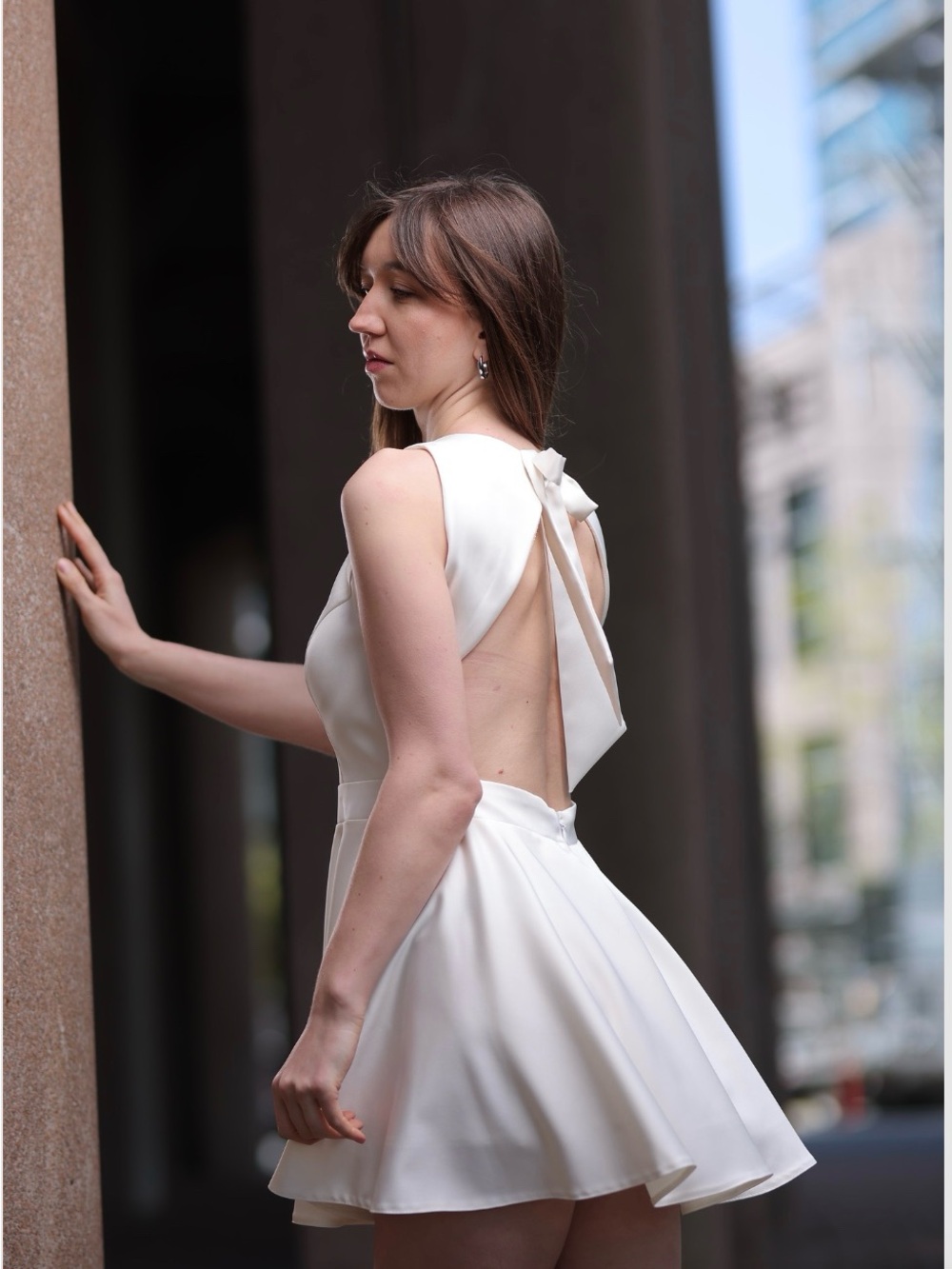 Sleeveless Cream Mini Dress with Open-Back Bow